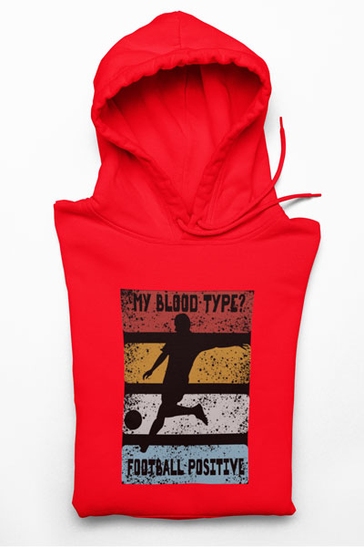 hoodie met de tekst “My Blood Type? Football Positive” en voetballer silhouet.